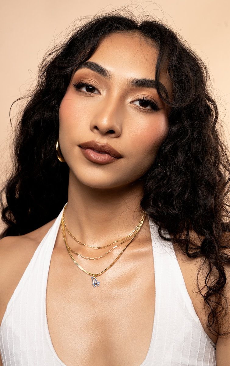 Beauty portrait with gold jewelry